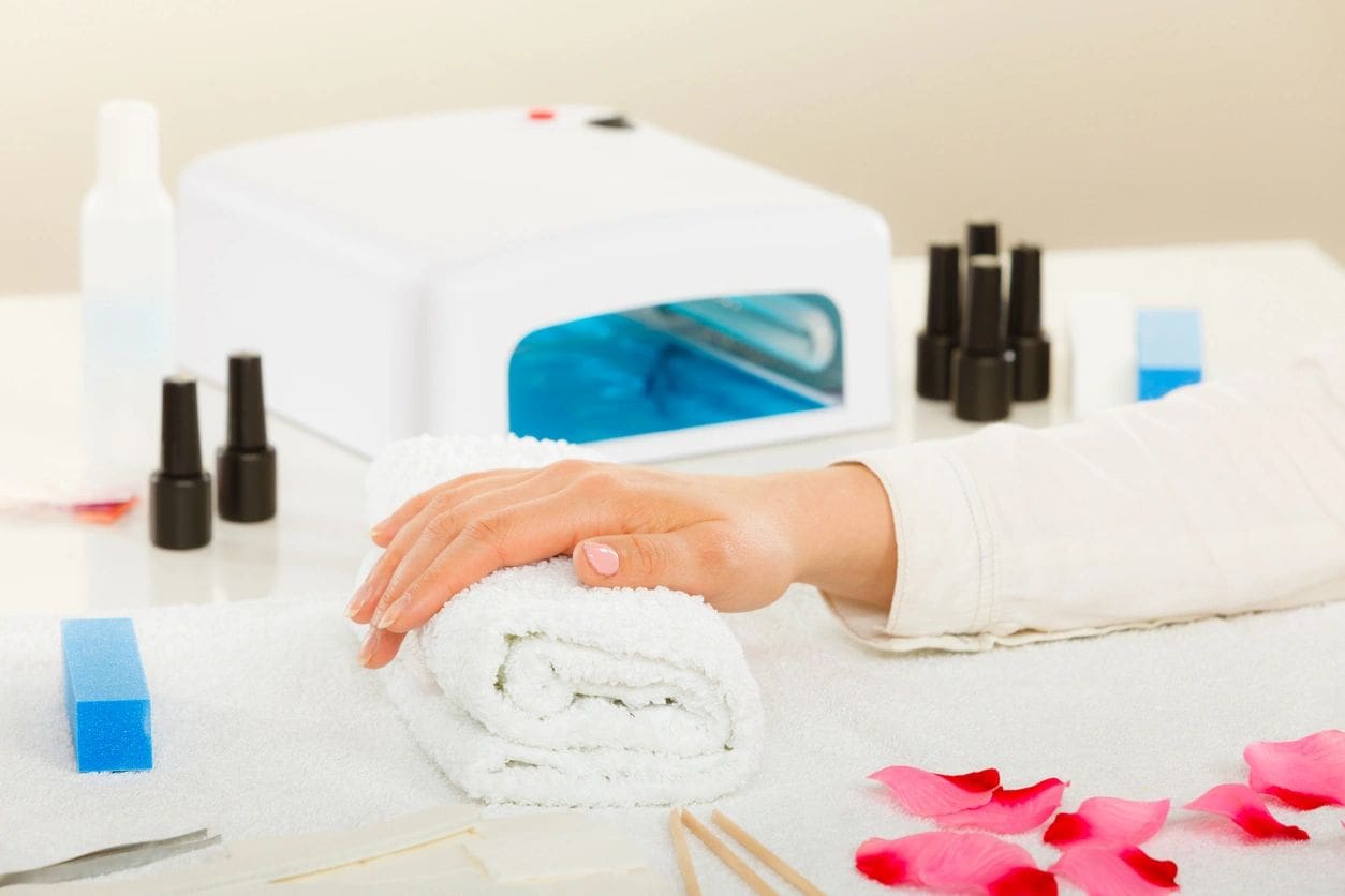 A person is getting her nails done at the nail salon.